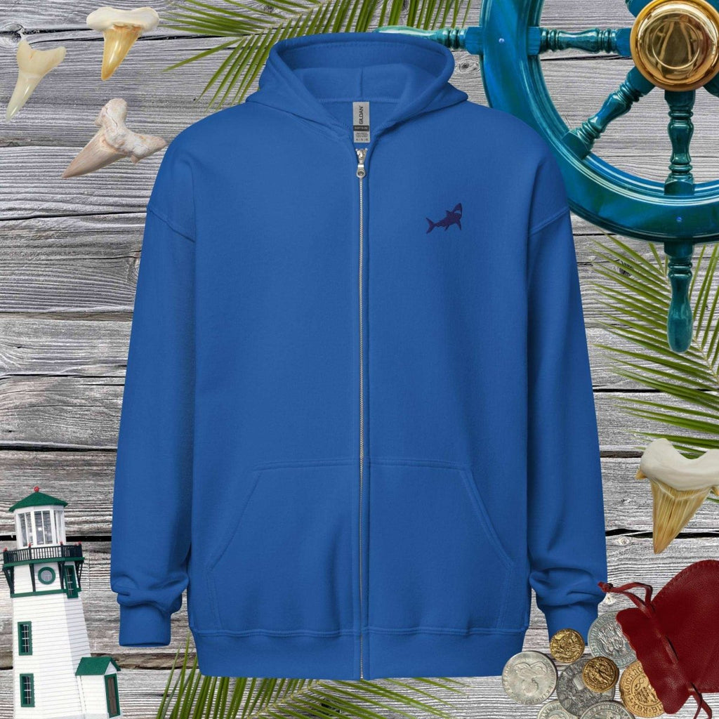 Blue zip hoodie with a shark logo on a decorative background with lighthouse, shark teeth, and coins.