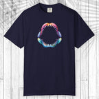 A navy blue short-sleeve t-shirt with a colorful graphic of an open shark mouth on the chest, displayed flat against a white wood plank background.