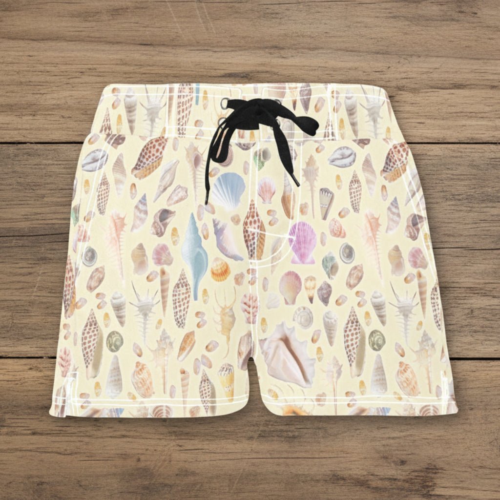 Beach shorts with shell pattern on a rustic wood background