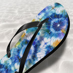 Flip-flop with a colorful Shibori pattern on a textured white background