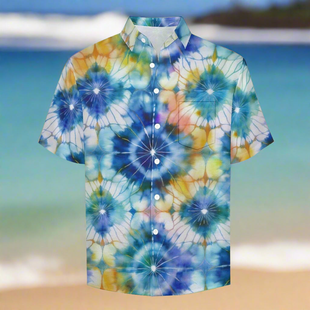 Colorful shibori style tie-dye print Hawaiian shirt on a beach in Maui