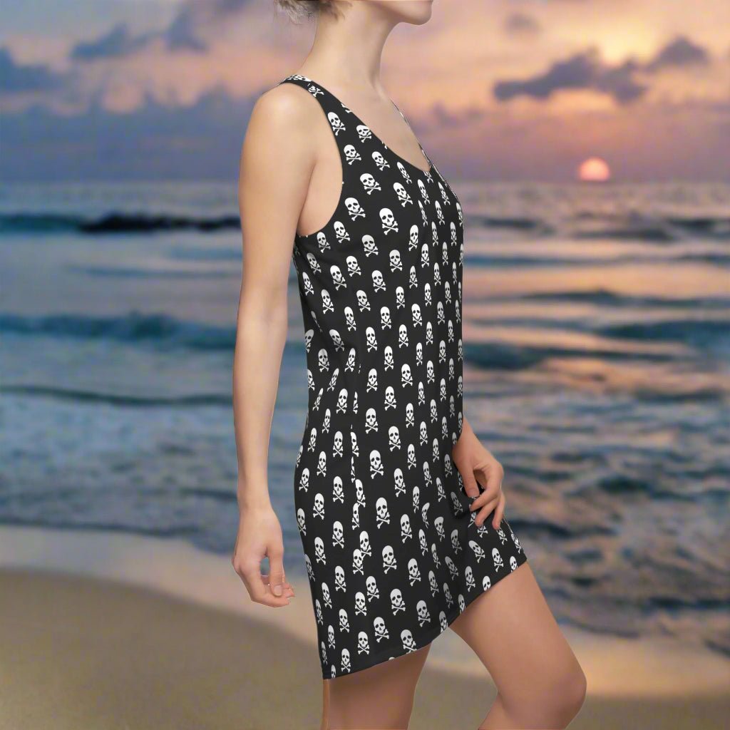 Tank Top Dress with fun Skull And Crossbones in a Polka Dot Pattern, worn by a hot swimwear model on fashion island beach