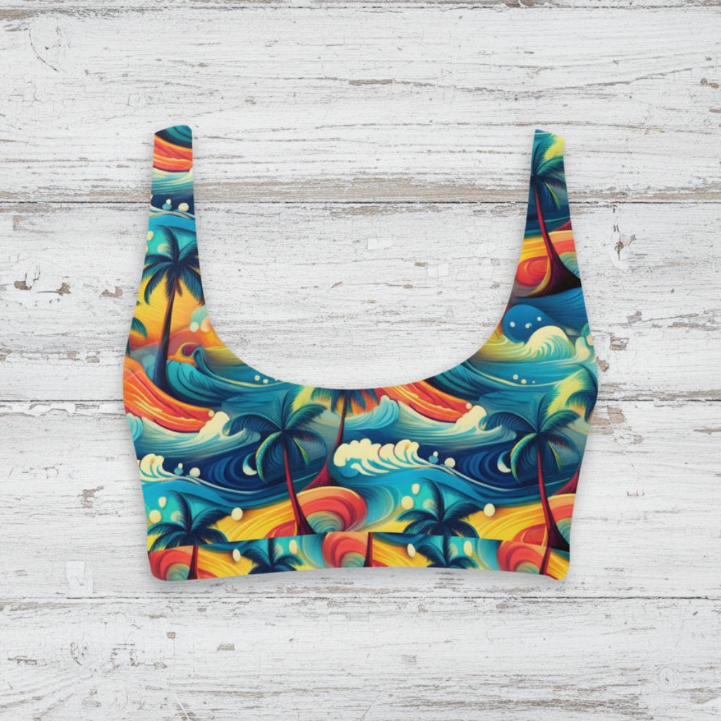 Colorful bikini top with tropical design on a rustic wood background