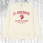 An off-white crewneck sweatshirt with a red graphic print reading 'ST. SOMEWHERE Caribbean Islands Where It's Warm Since 1946' with an eagle head illustration, displayed flat against a white wood plank background.