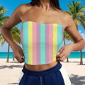 Pastel striped Bandeau Tube Top worn by a bikini model on a tropical island beach