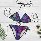 Colorful bikini set with abstract pattern on a white background