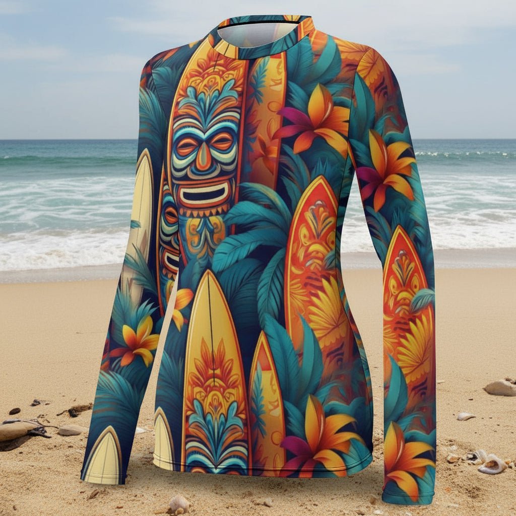 Colorful long-sleeve shirt with tiki mask and surfboard design on a beach background