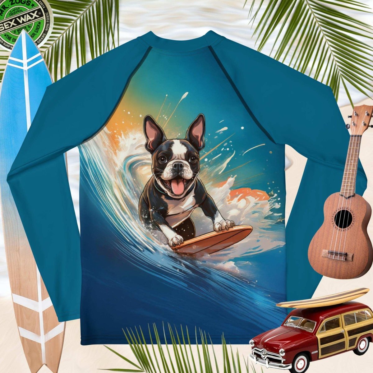 Blue rash guard with Surf Dog surfing design, surrounded by beach-themed items like a surfboard, ukulele, and vintage toy car.