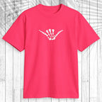 A bright pink short-sleeve t-shirt with a white skeletal hand graphic on the chest, displayed flat against a white wood plank background.