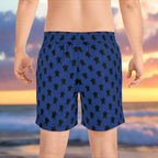 Sea Turtle Board Shorts worn by surfer dude looking out over the ocean as sunset