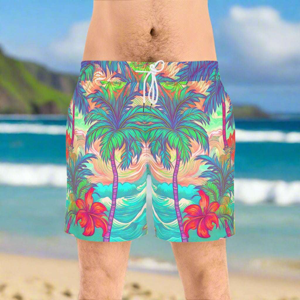 Surfer wearing island vintage swim shorts for guys standing on a beach in Hawaii