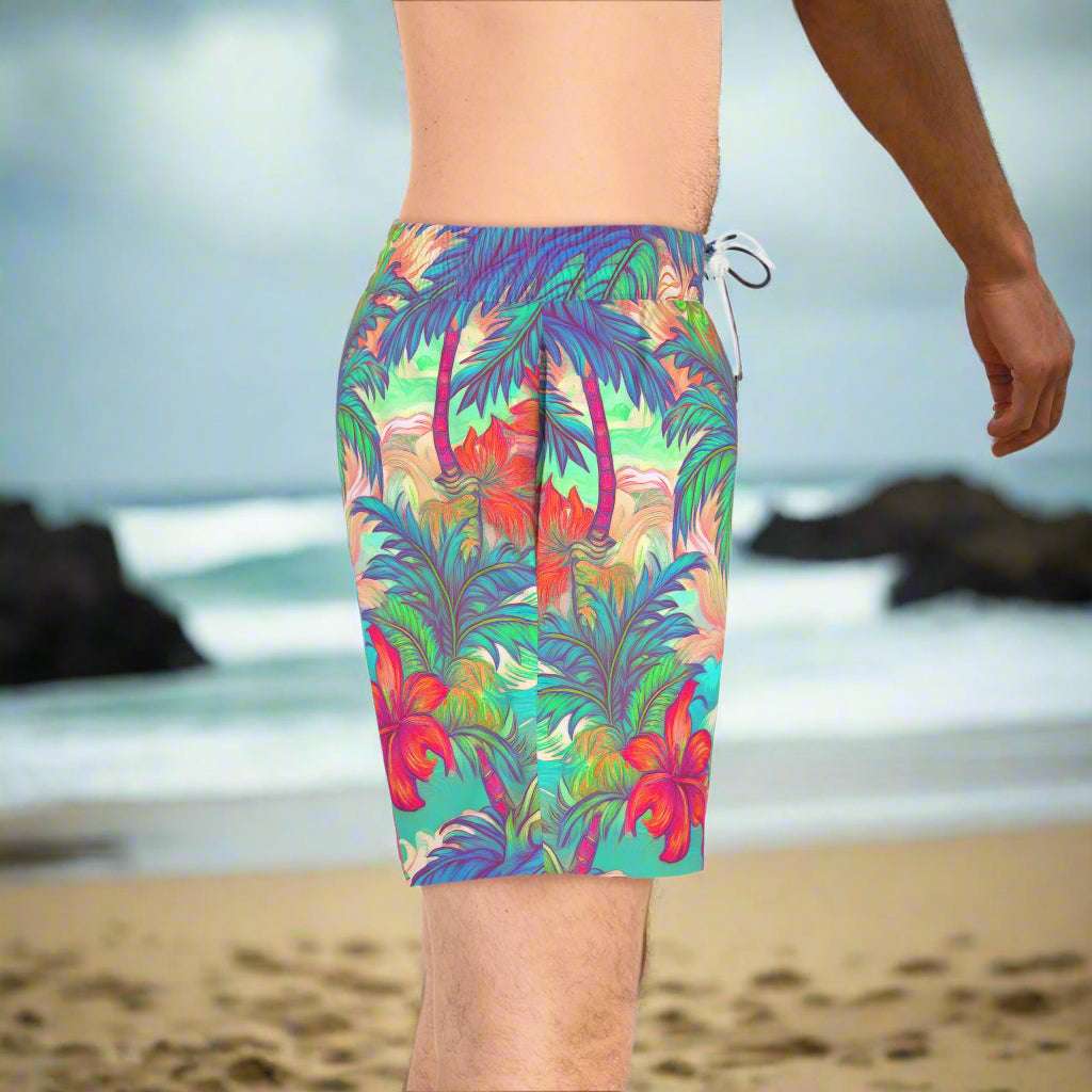 Pocket view of Island style swim shorts for guys as worn by a surfer dude standing on the beach in Hawaii