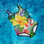 Hawaiian Style Floral swimsuit on a blue tiled pool floor