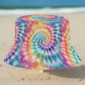 Colorful tie-dye bucket hat on a beach in Naples Florida