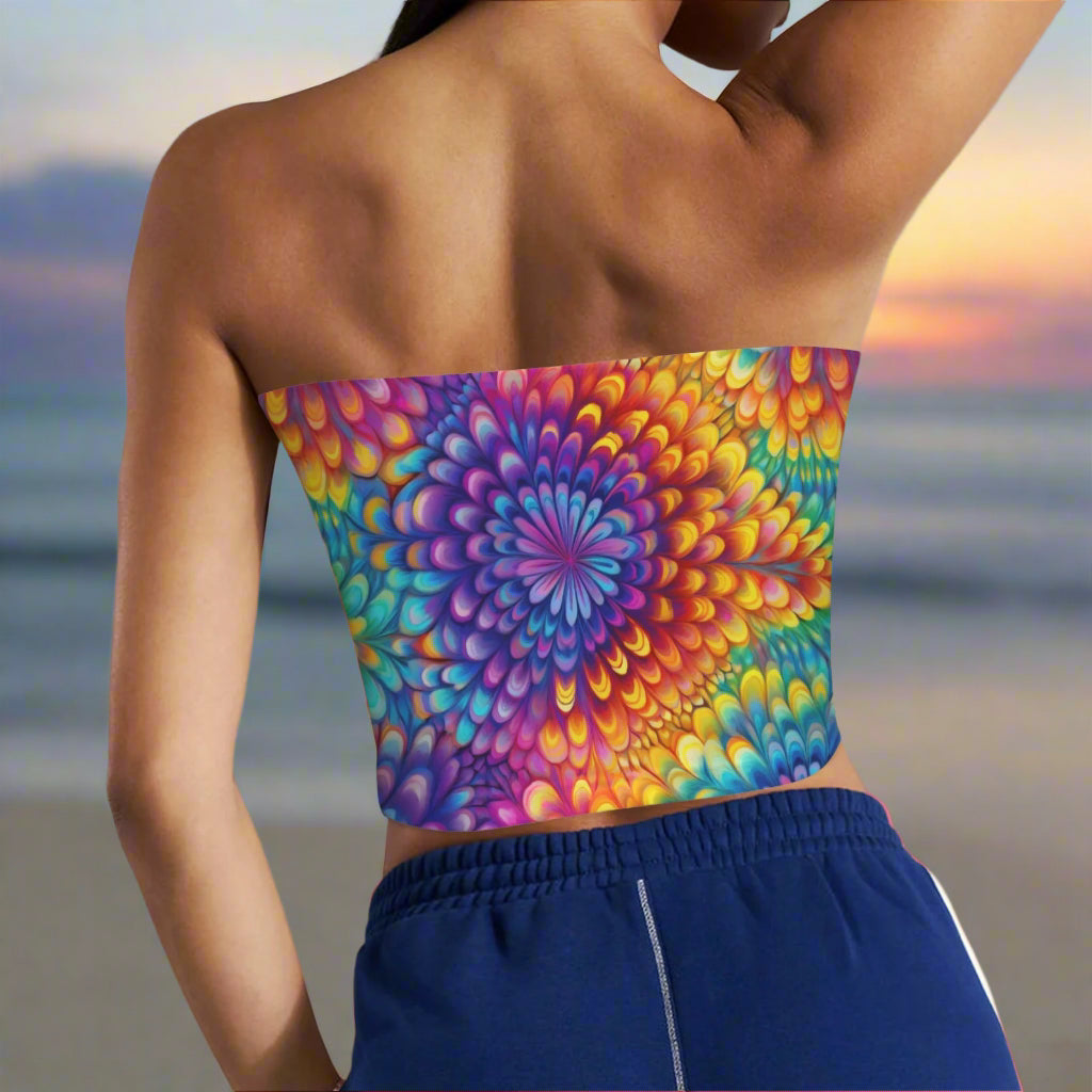 Colorful bandeau top with a geometric pattern worn by a swimsuit model on a California Beach