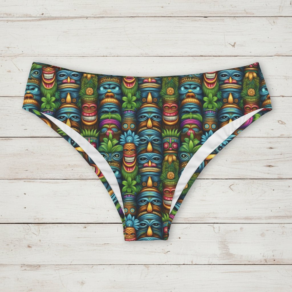 Colorful patterned underwear with tiki mask design on a white background