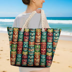 Person carrying a tote bag with colorful tiki mask pattern in a beach setting