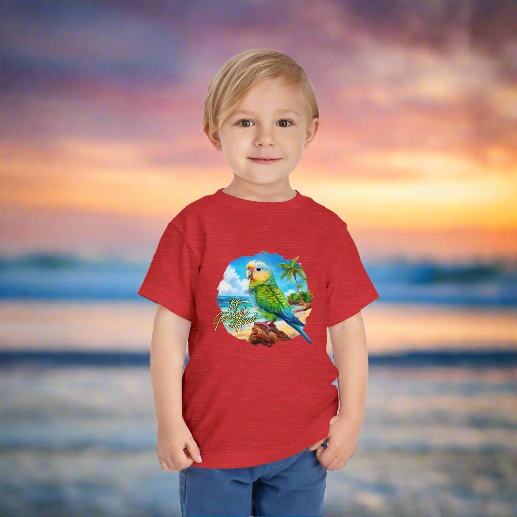Child wearing a red t-shirt with a parrot graphic against a beach sunset background