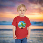 T-Shirts Toddler Parakeet Tee worn by  Lil' ParrotHead Boy Standing on the beach at sunrise.