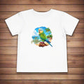 White t-shirt with a colorful parrot graphic on a wooden surface