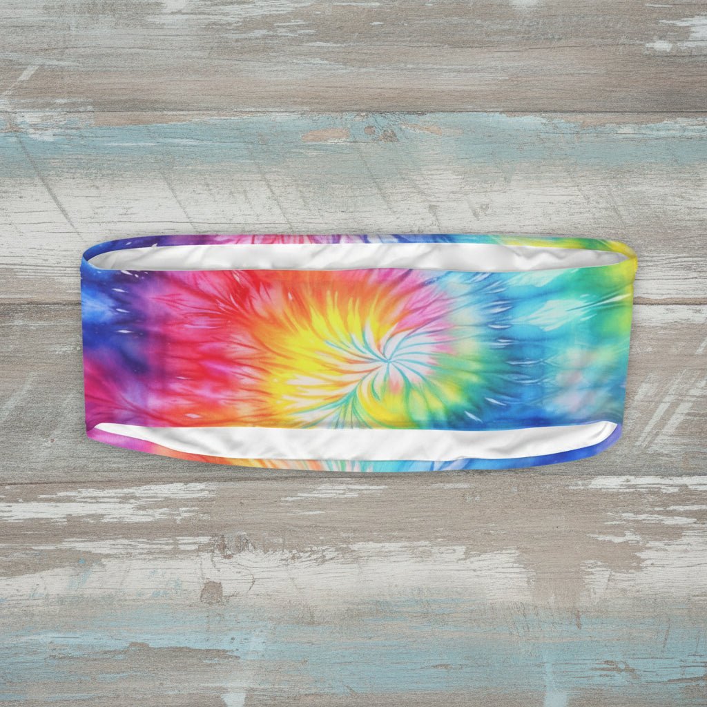Multicolored tie-dye headband on a nautical wood background