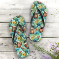 Flip-flops with a tropical design featuring birds and flowers on a wooden surface.