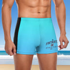 Person wearing turquoise swim shorts with 'FANTASTIC ATHLETICS' branding on a beach background