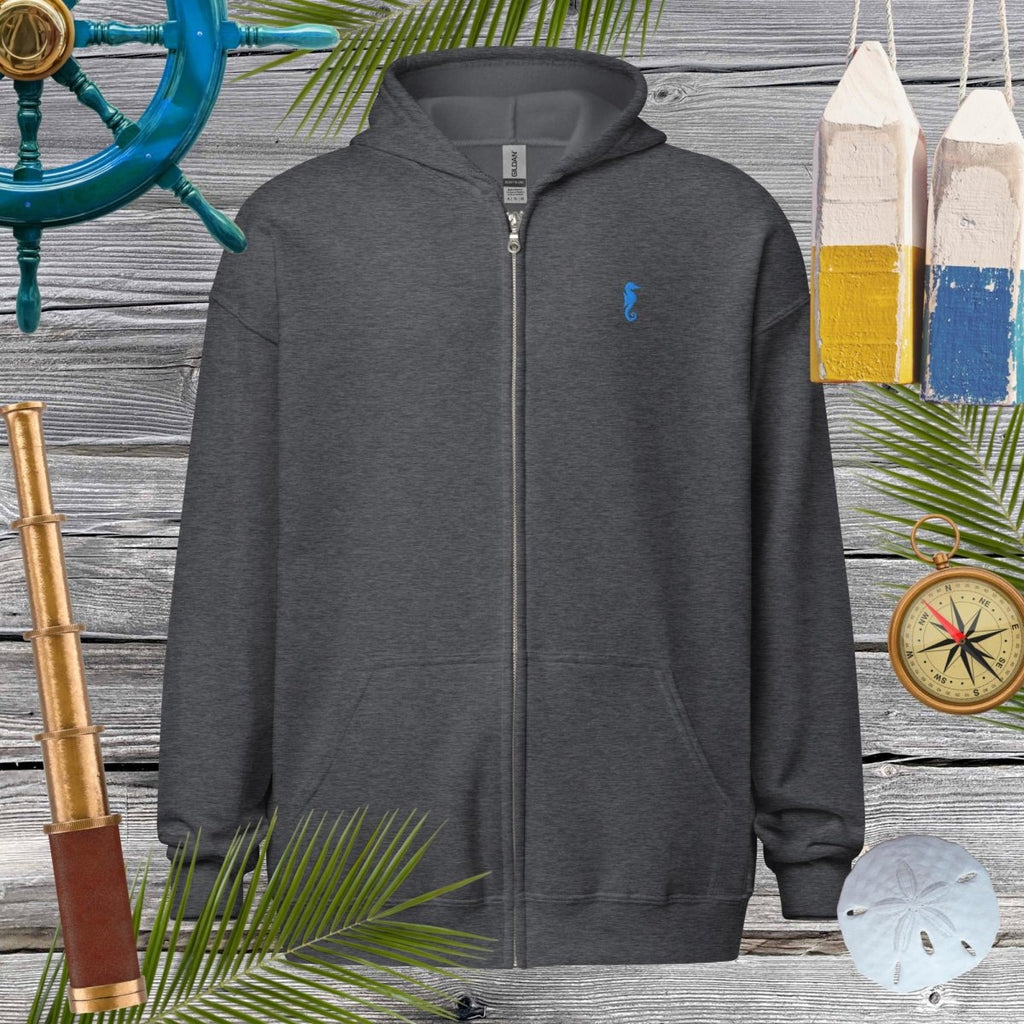 Unisex heavy blend zip hoodie featuring cool embroidered seahorse, perfect for cozy vibes and stylish looks.