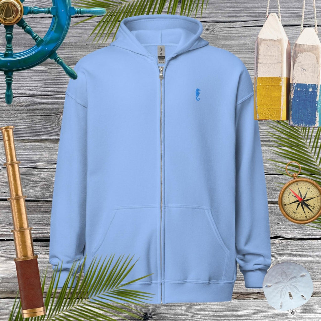 Unisex heavy blend zip hoodie in light blue with embroidered seahorse, perfect for stylish comfort and cozy vibes.