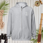 Gray hoodie with a logo on a wooden background with nautical items.