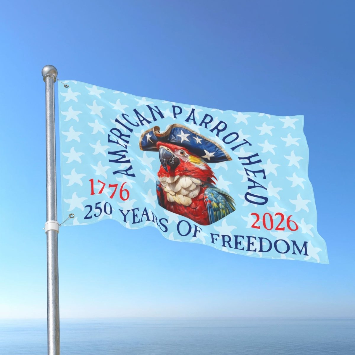 Flag with a parrot design and text celebrating 250 years of freedom, against a blue sky.