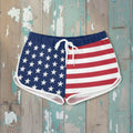 American flag patterned shorts on a rustic wood background