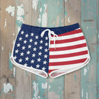 American flag patterned shorts on a rustic wood background