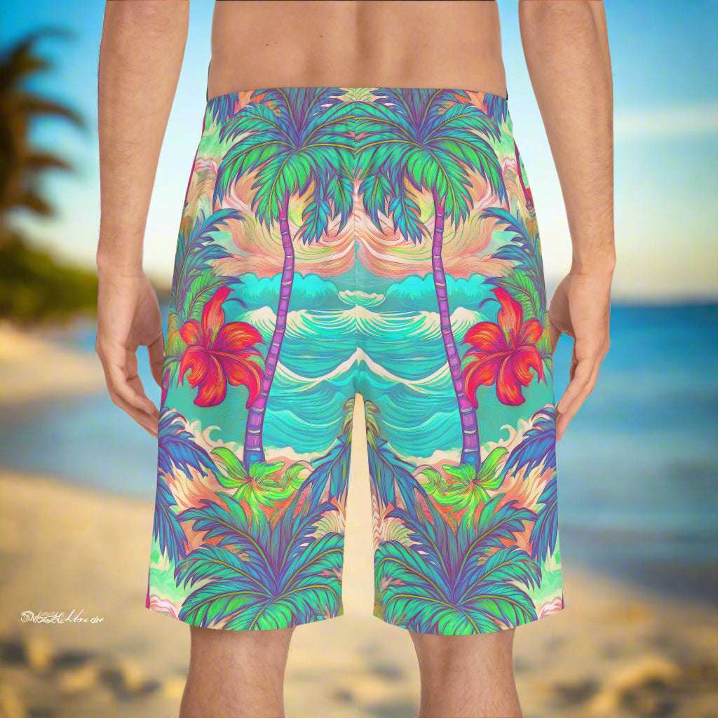 Surfer wearing vintage style aloha shorts by Bongo Beachwear waiting for high tide