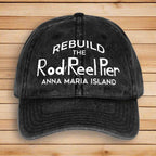 Black cap with white text on a wooden background