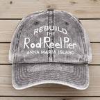 Gray distressed cap with white text on a wooden surface