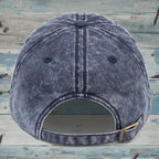 Blue denim cap on a wooden surface