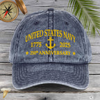 Gray cap with 'United States Navy 1775-2025 250th Anniversary' text on a wooden background