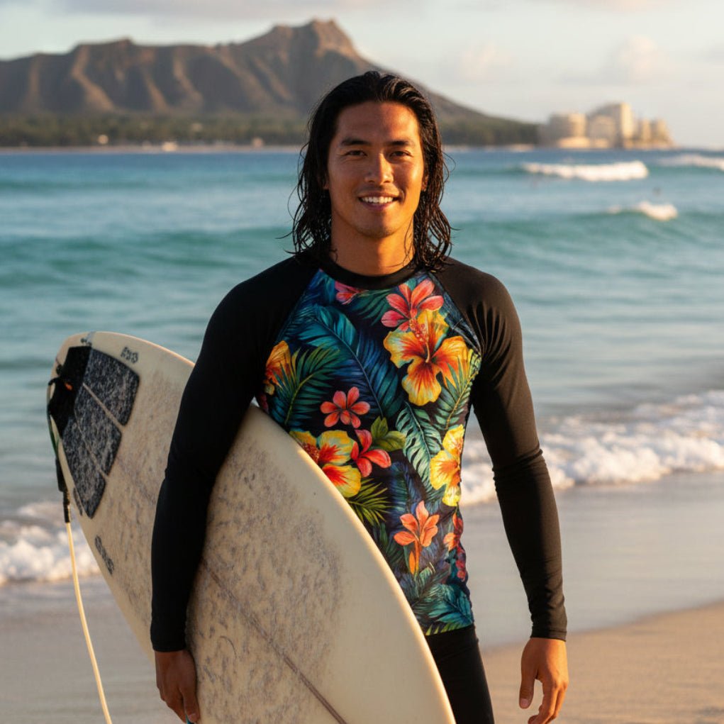 Surfer Dude wearing a black long-sleeve shirt with a colorful floral pattern on a Waikiki Beach