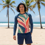 Man wearing a colorful long-sleeve shirt with abstract design on a West Palm Beach
